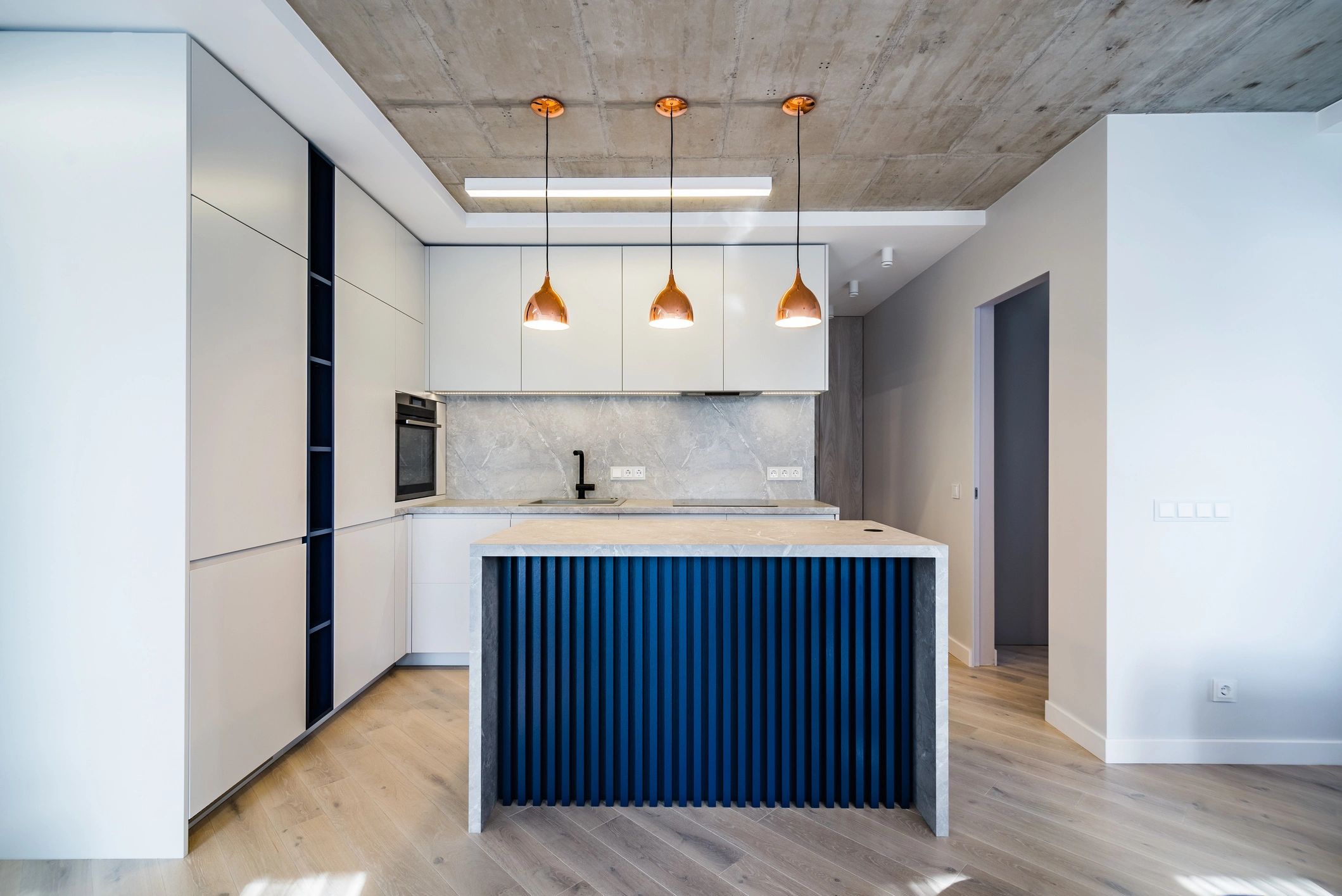 Modern kitchen with premium countertop surfaces and refined finishes